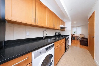 Welcome to this beautifully maintained first-floor condo in the - photo 8