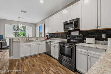 Located in the heart of Bayside Lakes, this beautifully - photo 15