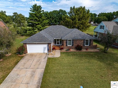 Nestled in the heart of the desirable Meadow Lake Country Club - photo 2