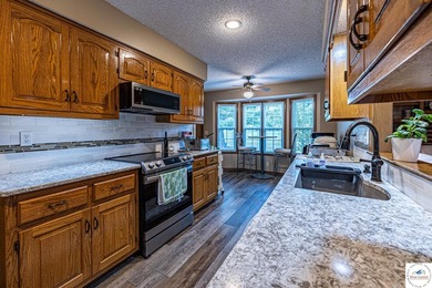 Nestled in the heart of the desirable Meadow Lake Country Club - photo 8