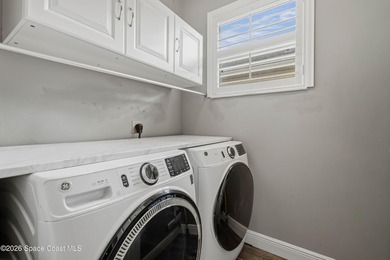 Located in the heart of Bayside Lakes, this beautifully - photo 29