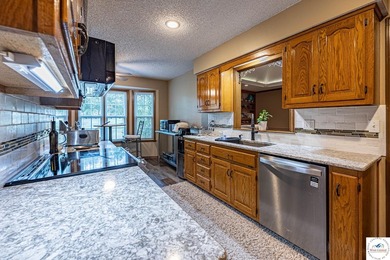 Nestled in the heart of the desirable Meadow Lake Country Club - photo 9