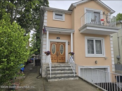 Welcome to this spacious and well-maintained two-family detached - photo 2