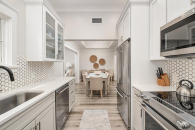 Thoughtfully redesigned with a refined coastal aesthetic, the - photo 8