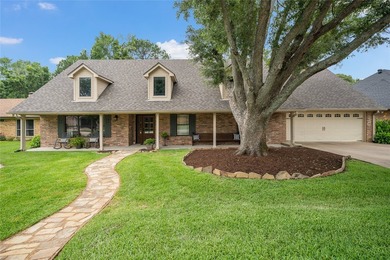Located within the gated community of Emerald Bay, this - photo 1