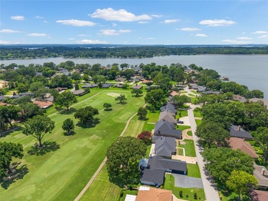 Located within the gated community of Emerald Bay, this - photo 3
