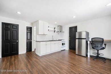 Welcome to 74 Targee Street! This fully renovated 2-family home - photo 5