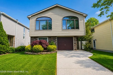 Located on a beautiful tree-lined block in the heart of - photo 1