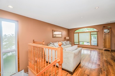 Located on a beautiful tree-lined block in the heart of - photo 2