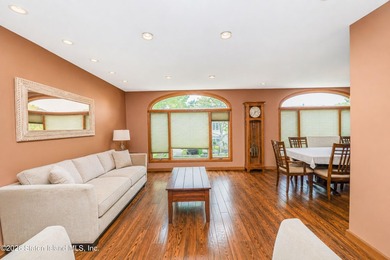Located on a beautiful tree-lined block in the heart of - photo 3