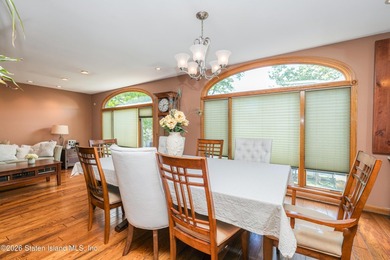 Located on a beautiful tree-lined block in the heart of - photo 5