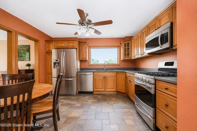 Located on a beautiful tree-lined block in the heart of - photo 7