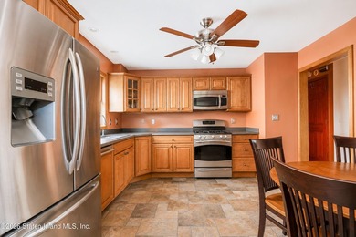 Located on a beautiful tree-lined block in the heart of - photo 8