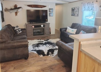 Rare offering! Affordable fully furnished lakefront retreat with - photo 3