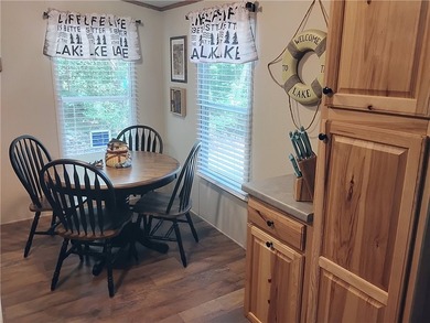 Rare offering! Affordable fully furnished lakefront retreat with - photo 6