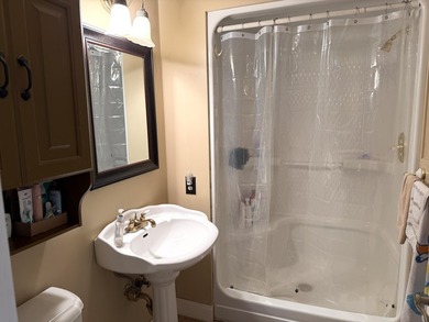 Enjoy lakeside living in this furnished, ranch-style home with - photo 11