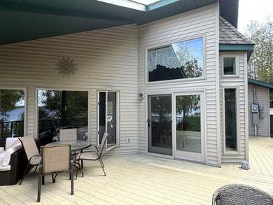 Enjoy lakeside living in this furnished, ranch-style home with - photo 12