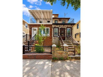 Welcome to this beautifully renovated, move-in-ready two-family - photo 3