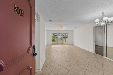 Charming two-bedroom, two-bathroom condo nestled in an all-age - photo 3