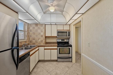 Charming two-bedroom, two-bathroom condo nestled in an all-age - photo 4