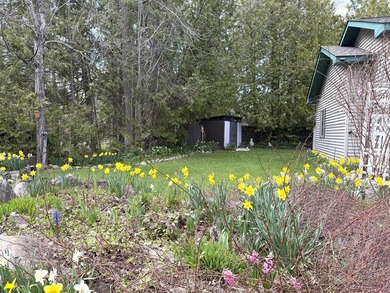 Enjoy lakeside living in this furnished, ranch-style home with - photo 14