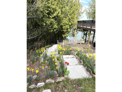Enjoy lakeside living in this furnished, ranch-style home with - photo 17