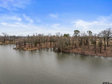 Discover the perfect waterfront retreat with this 1.09 +/- acre - Lake Lot For Sale in Mount Pleasant, Texas