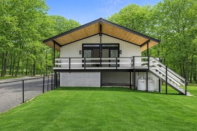Tucked away on a full acre in the heart of Hampton Bays, this - photo 22
