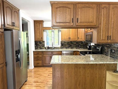 Enjoy lakeside living in this furnished, ranch-style home with - photo 35