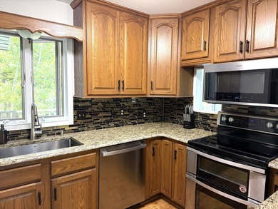 Enjoy lakeside living in this furnished, ranch-style home with - photo 36