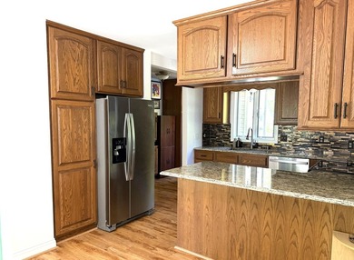 Enjoy lakeside living in this furnished, ranch-style home with - photo 39