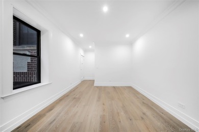 This is Unit 5B at the Savoy Court in Astoria, a fully remodeled - photo 4