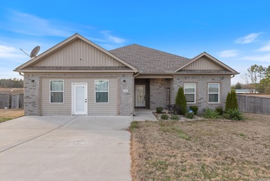 This one-level home is situated on a property where chickens and