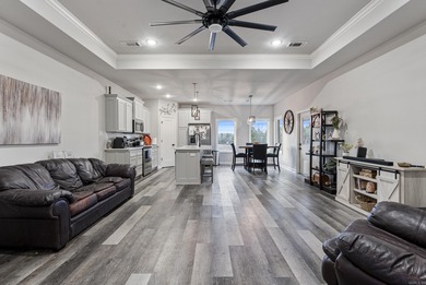 This one-level home is situated on a property where chickens and