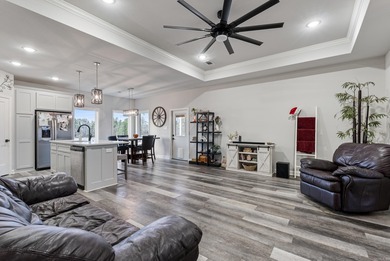 This one-level home is situated on a property where chickens and