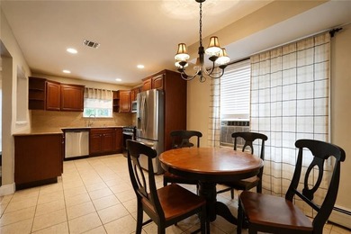 Tottenville-Fully detached two family home, 7 room duplex over a - photo 8