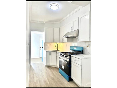 BEAUTIFULLY RENOVATED BRICK SINGLE -FAMILY HOME IN A PRIME - photo 6