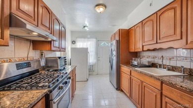 Welcome to 1128 E 84th Street, a well-maintained two-family home - photo 11