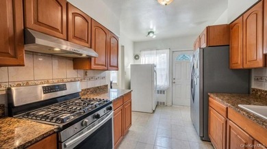 Welcome to 1128 E 84th Street, a well-maintained two-family home - photo 12