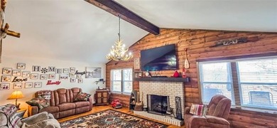 LAKEFRONT RUSTIC CHARM + PLATFORM DOCK!! Nestled along the