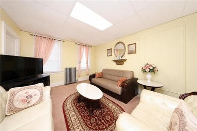 Mixed-use property featuring 1 store and 1 residential unit in - photo 5