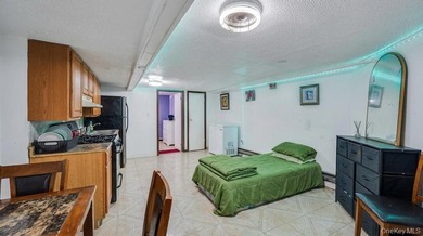 Welcome to 1128 E 84th Street, a well-maintained two-family home - photo 31