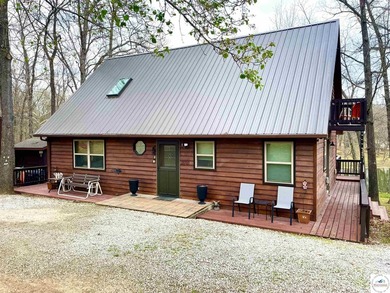 Enjoy peaceful lake living in this bright and beautiful home - photo 1