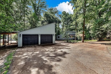 Discover this lakeside retreat offering tranquility and lake - photo 2