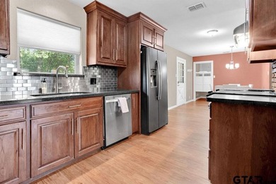 Welcome to this inviting 3-bedroom, 2 bath brick home featuring - photo 13