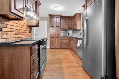 Welcome to this inviting 3-bedroom, 2 bath brick home featuring - photo 14
