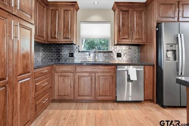 Welcome to this inviting 3-bedroom, 2 bath brick home featuring - photo 15