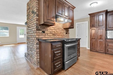 Welcome to this inviting 3-bedroom, 2 bath brick home featuring - photo 16