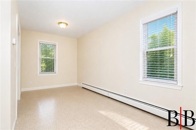 Amazing opportunity to present this two family property in the - photo 6