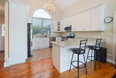 Lake Views, Waterfront Living & Room to Spread Out! Wake up to - photo 12